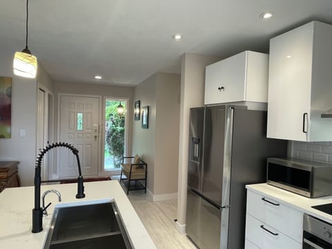 Formal entry way. Gourmet kitchen. 