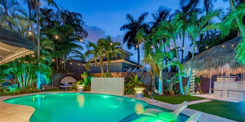 
Outdoor Oasis with Heated Pool, Lighting, Magic Bowls, Waterfall, Tiki Hut, Hammock, Swings, BBQ, Outdoor Table, Sound system & More!!