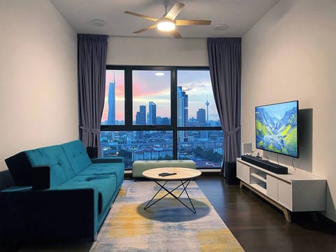 Welcome to La Gente Comfy Stay and we wish you have a very pleasant and cozy stay here at our home~ Here is our living area with 55" 4K HDR TV, very nice surround speakers system and amazing KL city view, all yours to enjoy~
