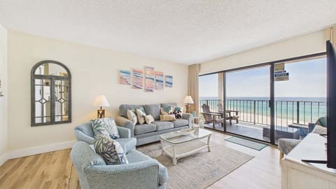 Open concept living area with stylish furnishings