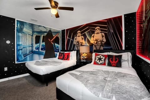 Designed with comfort and imagination in mind, this Star Wars themed bedroom features two queen beds, creative details, a flat-screen TV, and high-speed Wi-Fi for the perfect combination of fun and relaxation.