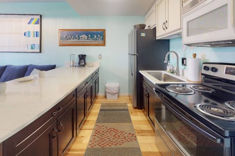 Large Kitchen Area with Granite Countertops, all small appliances and full size range.