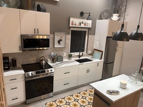 Stainless appliances, custom lighting, high end cabinetry.  