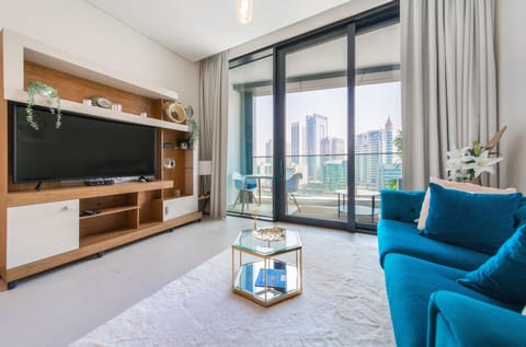 Premium Apartment, 1 Bedroom, Non Smoking, Marina View | Living area | 49-inch Smart TV with cable channels, TV, streaming services