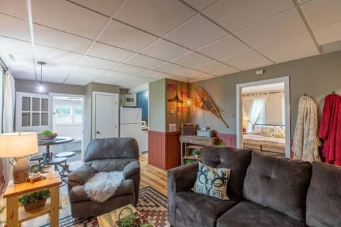 Indulge in comfort and style in our living room, featuring plush sofas, and elegant chairs. Cozy up by the fireplace, and unwind with entertainment on the TV.