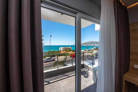 Deluxe Double Room, Balcony, Sea View | In-room safe, desk, blackout drapes, free WiFi