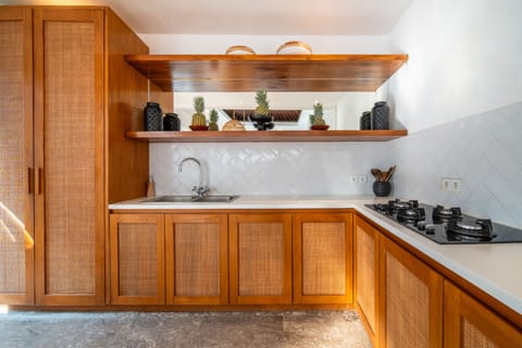 Villa | Private kitchen | Fridge, microwave, oven, stovetop