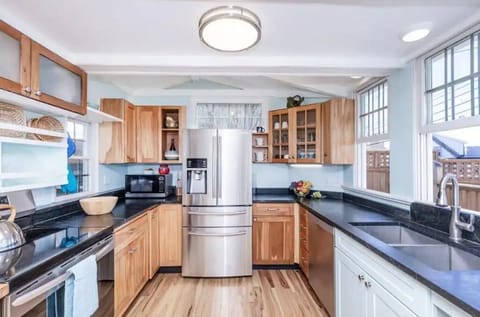 A fully equipped kitchen with all new stainless appliances
