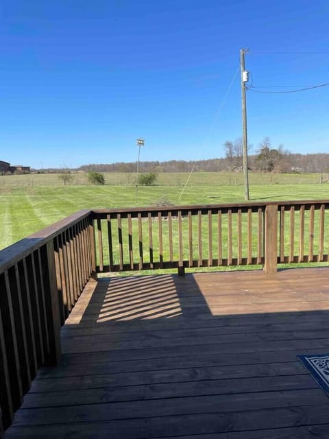 Look for wildlife from the deck of this peaceful back yard!