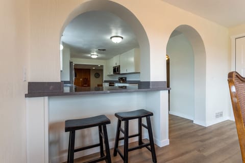 Dining room has two island seats.