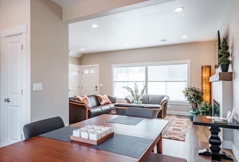 Gather around an expandable dining table that seats up to eight.