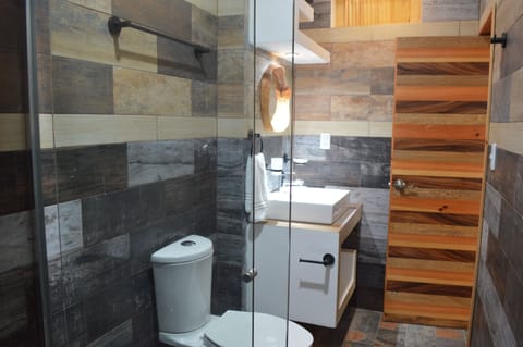 Family Quadruple Room, 1 Bedroom | Bathroom | Shower, rainfall showerhead, towels, soap