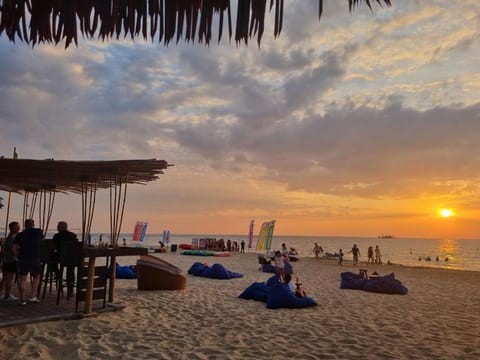 Beach nearby, white sand, beach shuttle, beach bar