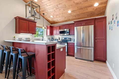 Modern kitchen with bar seating for 4