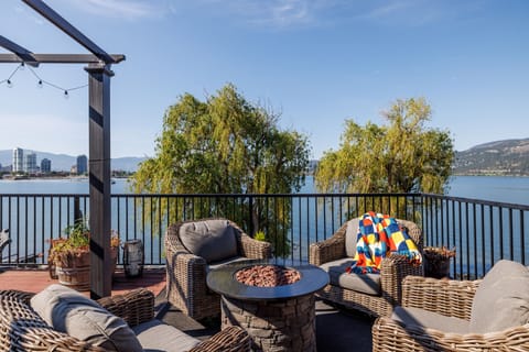 Upper Deck w Okanagan Lake view & city view of downtown Kelowna. Cozy fire pit