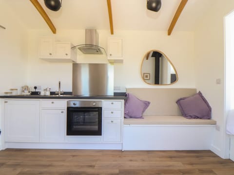 Fridge, electric kettle, cookware/dishes/utensils