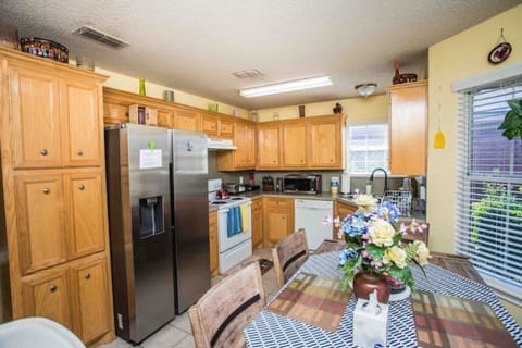 Dining table with 6 chairs for whole family  to enjoy a meal.