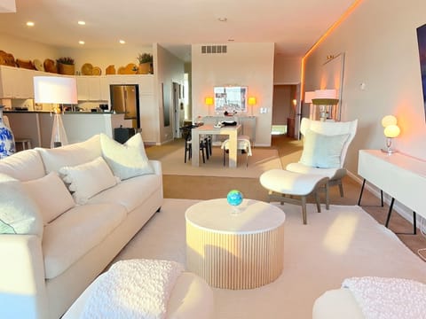 The living room brings in lots of natural light and plenty of space to relax