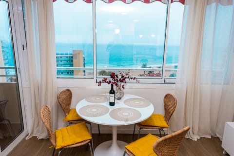 Dine at the panoramic windows with stunning views of the sea