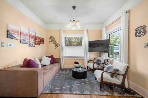 The living room has updated furniture to make your stay more comfortable