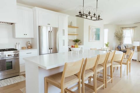 Plenty of room to gather and feast! 🍽️✨ Our spacious dining area and kitchen island seating offer the perfect setup for shared meals and conversations. Come together and create lasting memories in this inviting space.