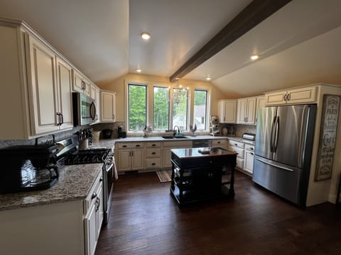 Spacious Kitchen stocked with quality cookware, staples and a fountain view