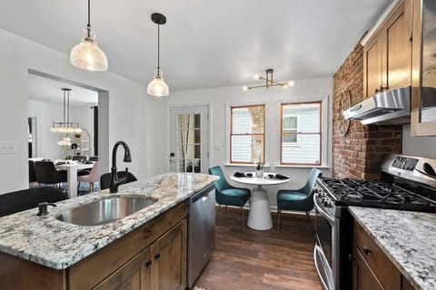 A sleek kitchen sink and spacious cooking area, perfect for preparing your favorite meals with ease.