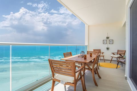 wooden dining table and seating area on patio