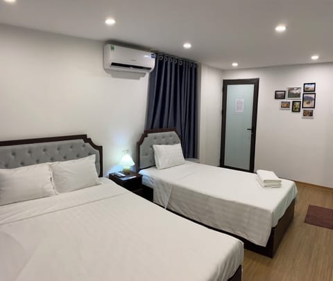 Deluxe Triple Room | Iron/ironing board, free WiFi