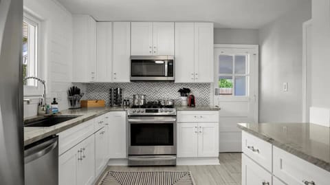 Whip up delicious meals in this fully equipped kitchen! 