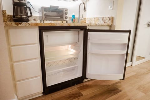 Mini fridge located in the kitchenette