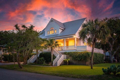 Gorgeous coastal home with modern touches and stunning sunset vistas to enjoy each evening.