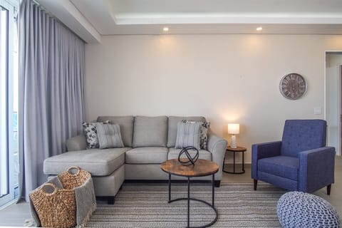 Muted colors greet you on the living room