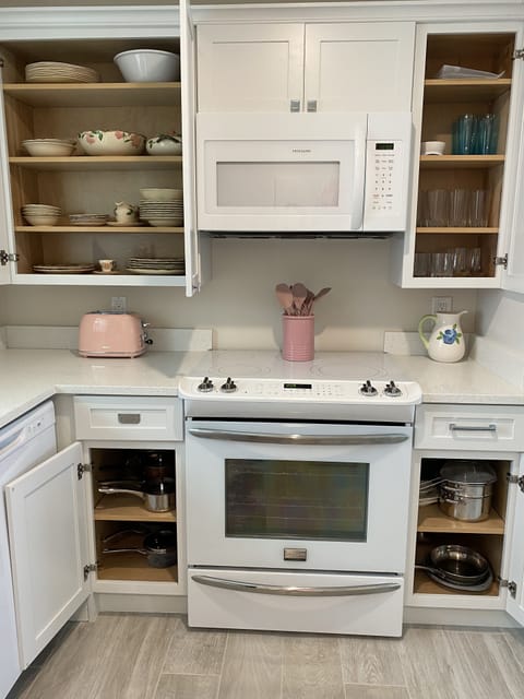 PLENTY OF DISHES, GLASSES AND POT & PANS PROVIDED