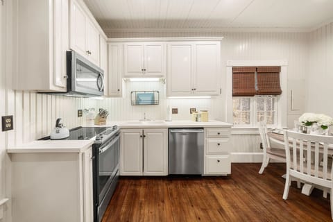 Kitchen is outfitted with a smooth top electric range