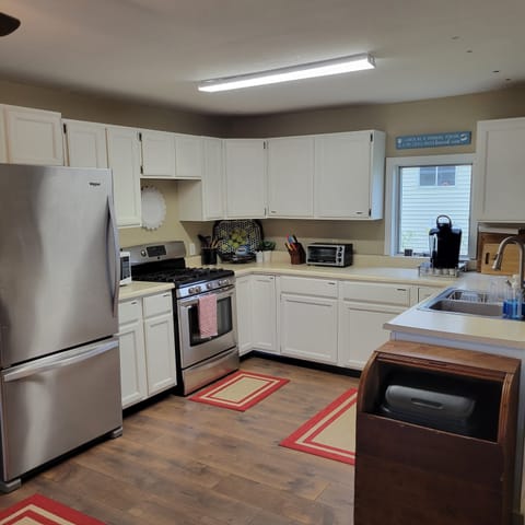 Propane gas oven, microwave and full-size refrigerator