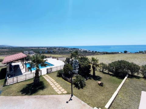 Panoramic view of the property set on a 4,060 sqm hillside plot