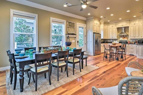 Main Floor Kitchen: Everyone can eat together! Two tables seat a combined 14 people.