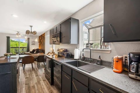 Condo, Multiple Beds, Balcony, Garden View (Time Traveler Suite) | Private kitchen | Coffee/tea maker, dining tables