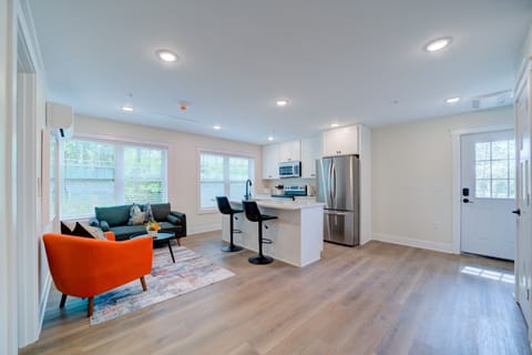 Deluxe Suite | Living area | 55-inch Smart TV with digital channels, streaming services