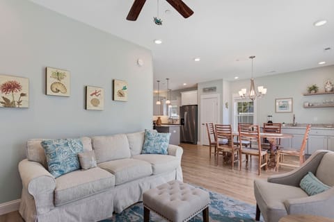 Relax in the spacious Living Area with a Flatscreen TV and plenty of comfortable furniture that makes every night movie night!