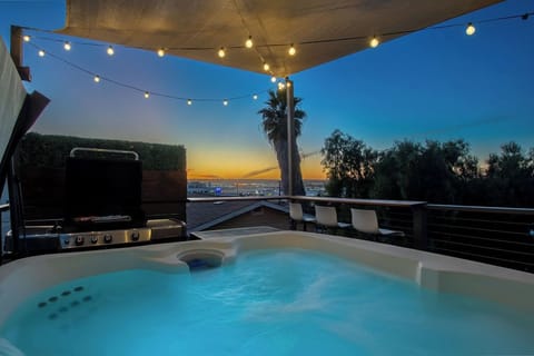Soak in the private hot tub, fire up the grill, and enjoy your own elevated outdoor retreat.