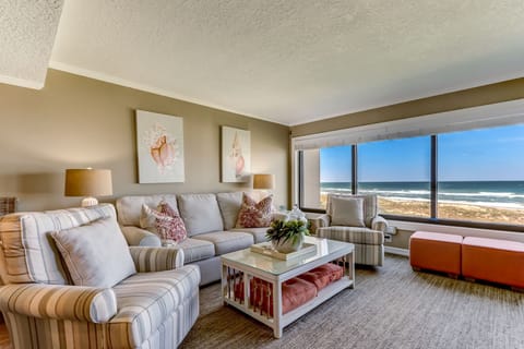 Stylishly Decorated Living and Dining Area with Breathtaking Oceanfront Views