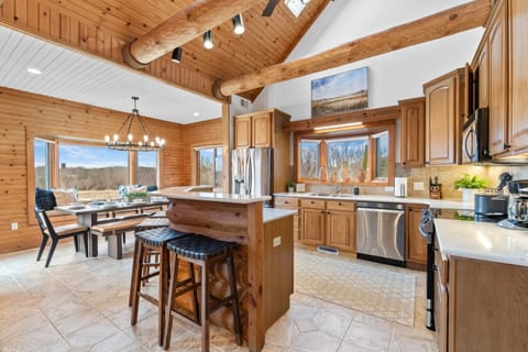 Spacious chef’s kitchen designed for cooking, gathering & good company.