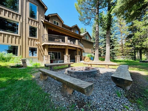 Exterior-Backyard with fire pit and seating 