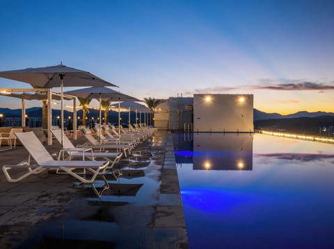 Indoor pool, seasonal outdoor pool, cabanas (surcharge), pool umbrellas