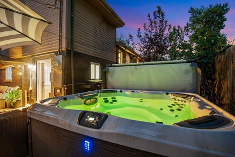 Evening view of hot tub. Lights can be customized and waterproof speakers built in to elevate your experience. 