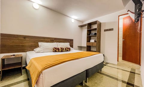 Standard Double Room | Blackout drapes, iron/ironing board, free WiFi, bed sheets