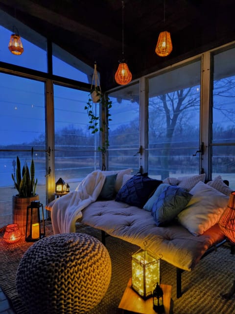 Get cozy in the screen porch!
