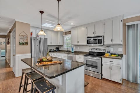 Cook up a feast in our fully-equipped kitchen with modern appliances and ample counter space.